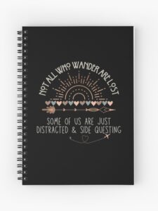 adhd merch: adhd notebook 'not all who wander are lost; distracted and side questing' boho style